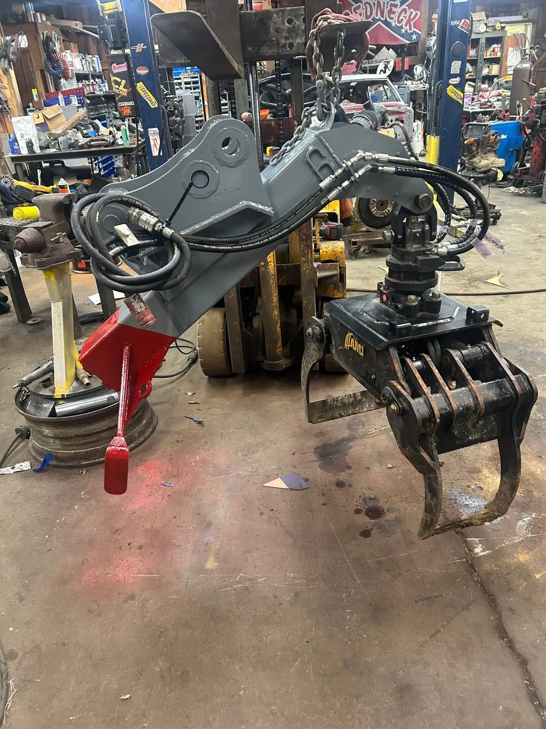 Custom grapple attachment fabricated in the shop