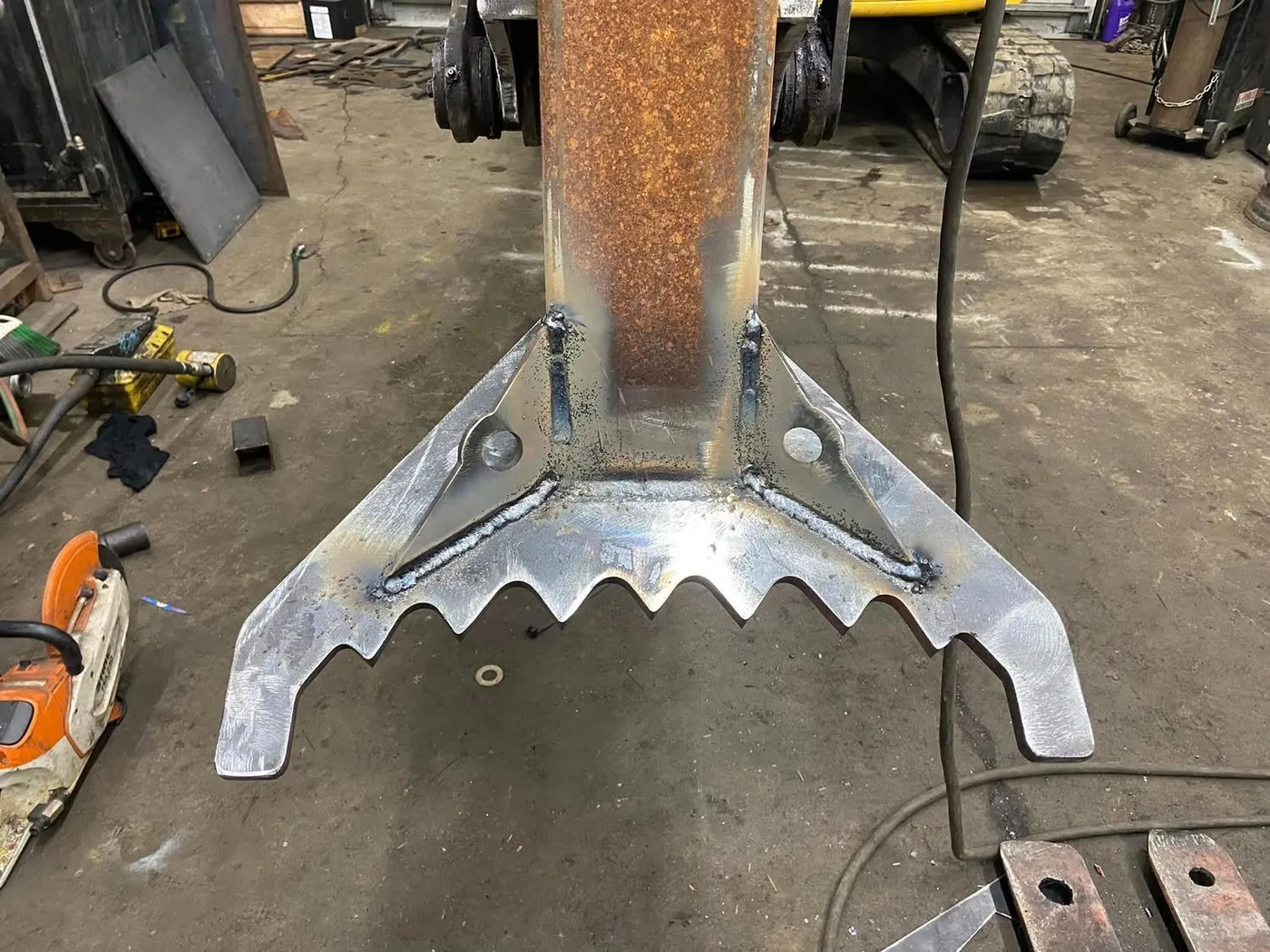 Fresh welds on a custom fabricated steel attachment