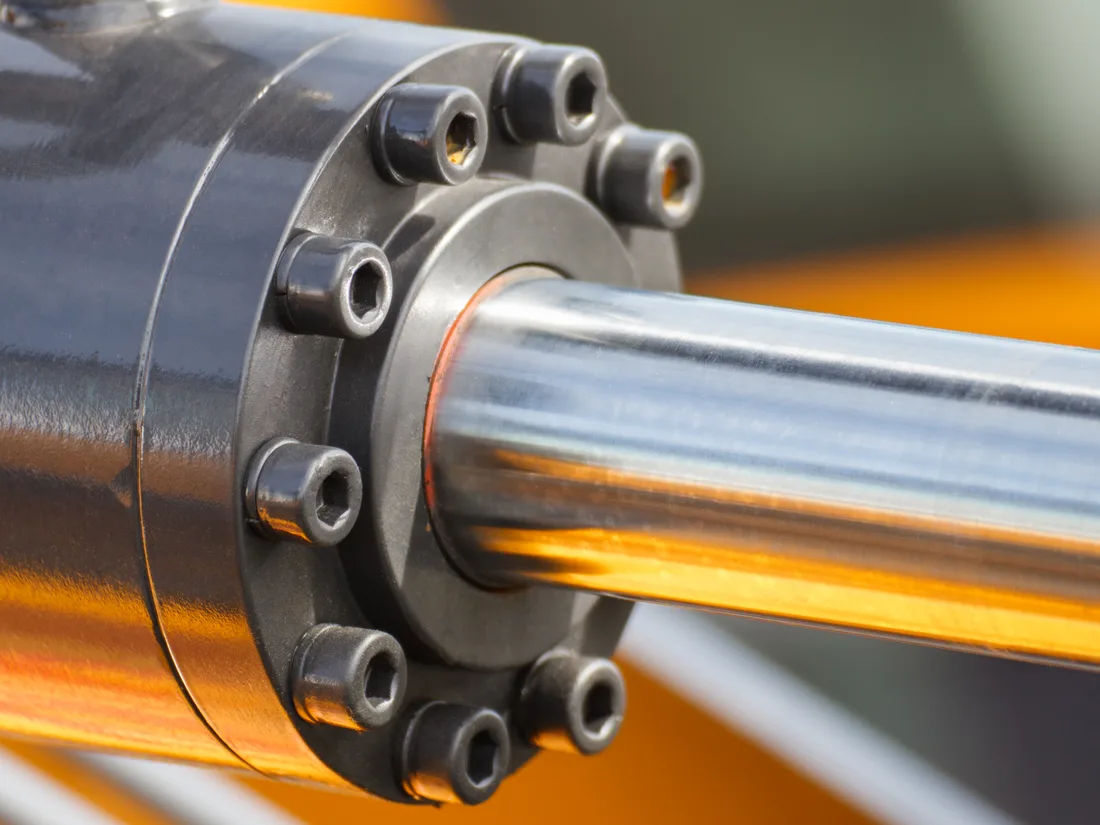 Close-up of a polished hydraulic cylinder